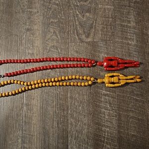 Wooden stick figures necklaces